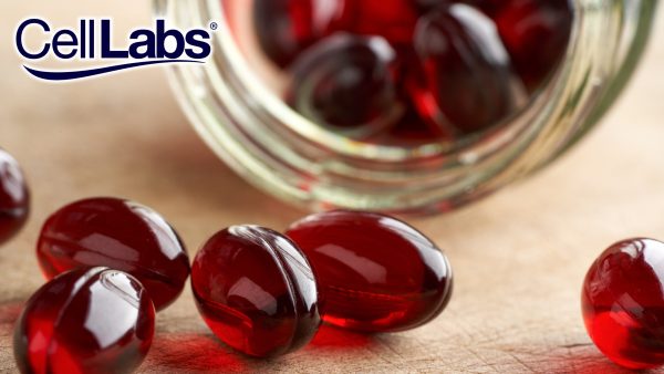 Image of supplement bottle with red pills as banner for blog on astaxanthin.