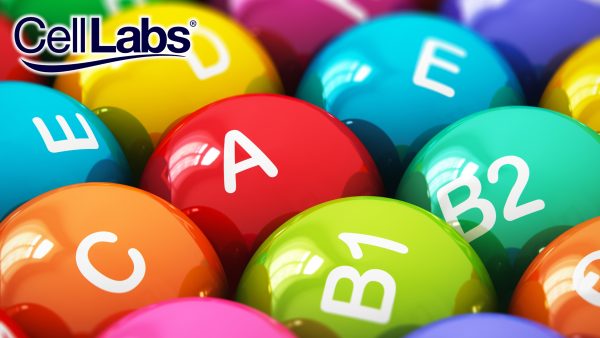 Image of different vitamins such as A, B1, B2, E, C, and more in the form of candy tablets.